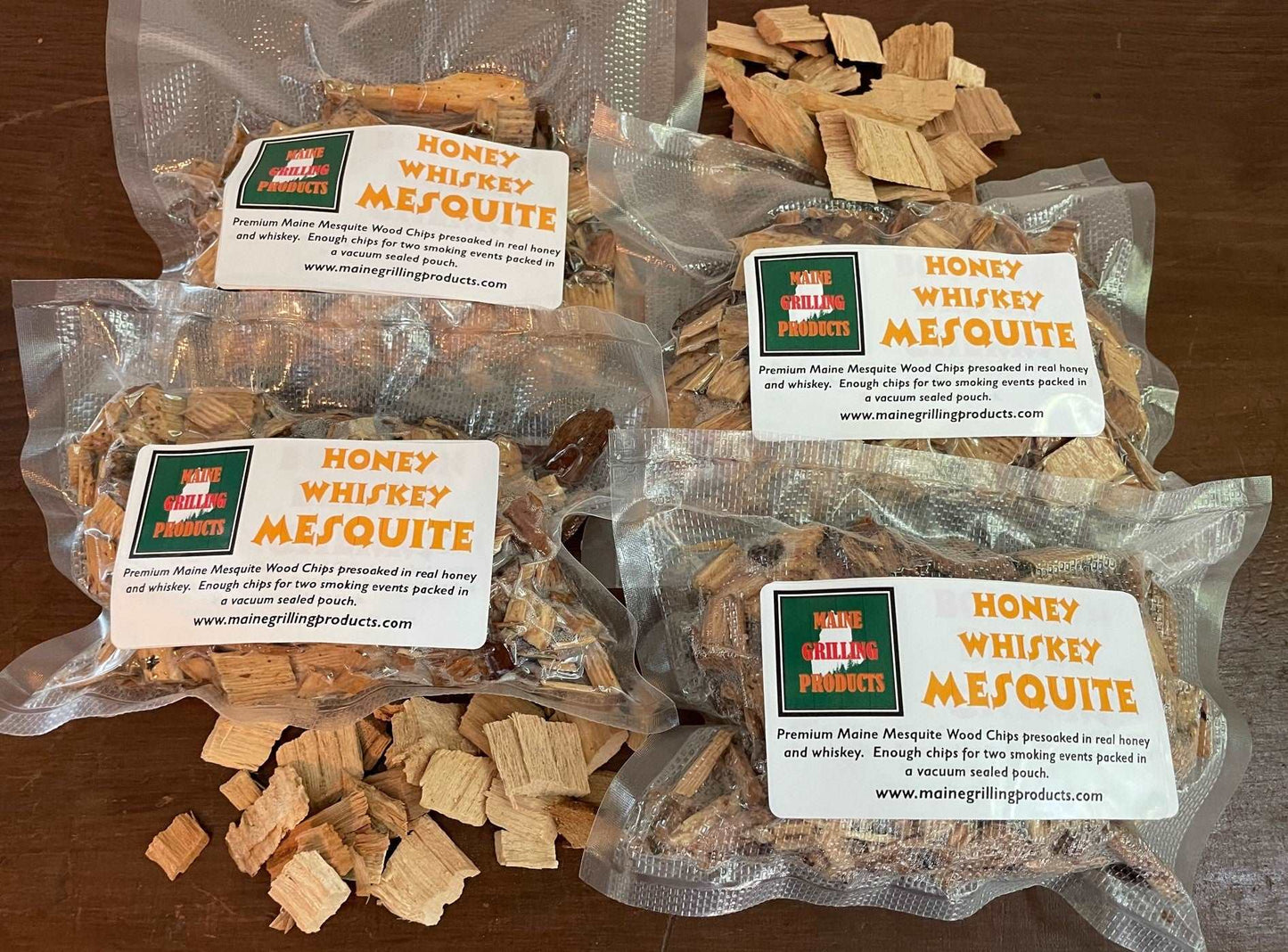 FOUR (6 OZ POUCHES) PRE-SOAKED FLAVORED MAINE HONEY WHISKEY MESQUITE WOOD CHIPS