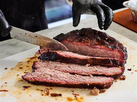 What is the best way to smoke a brisket on a propane grill?